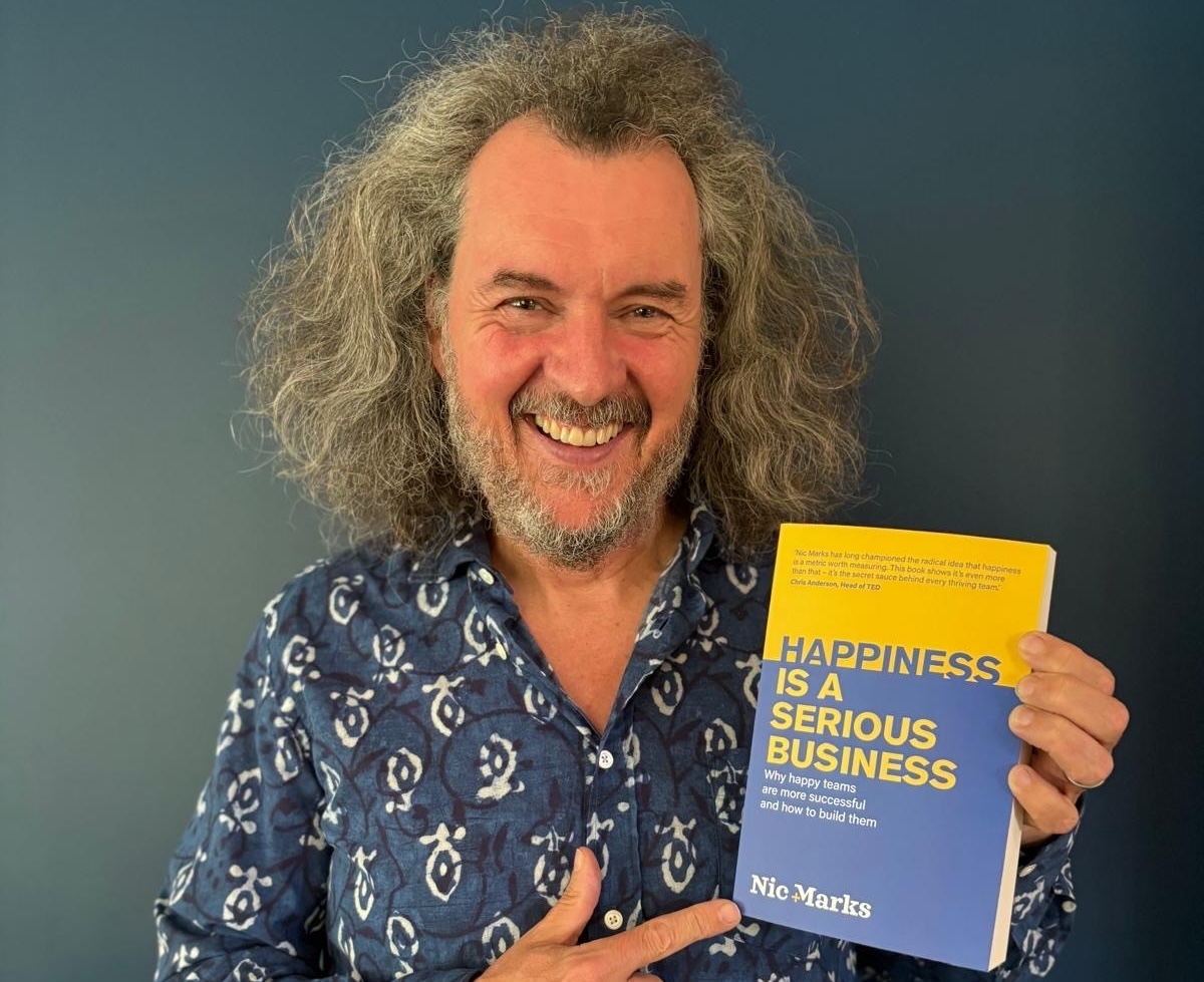 Nic Marks with book Happiness is a Serious Business